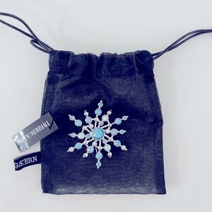 Dyrberg & Kern silver brooch with aqua blue Swarovski crystals.